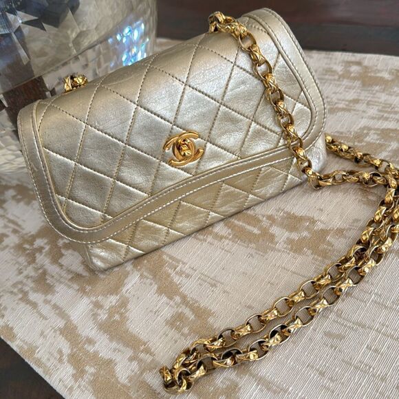 CHANEL Handbags - Vintage CHANEL 24k Gold Mini Flap Bag